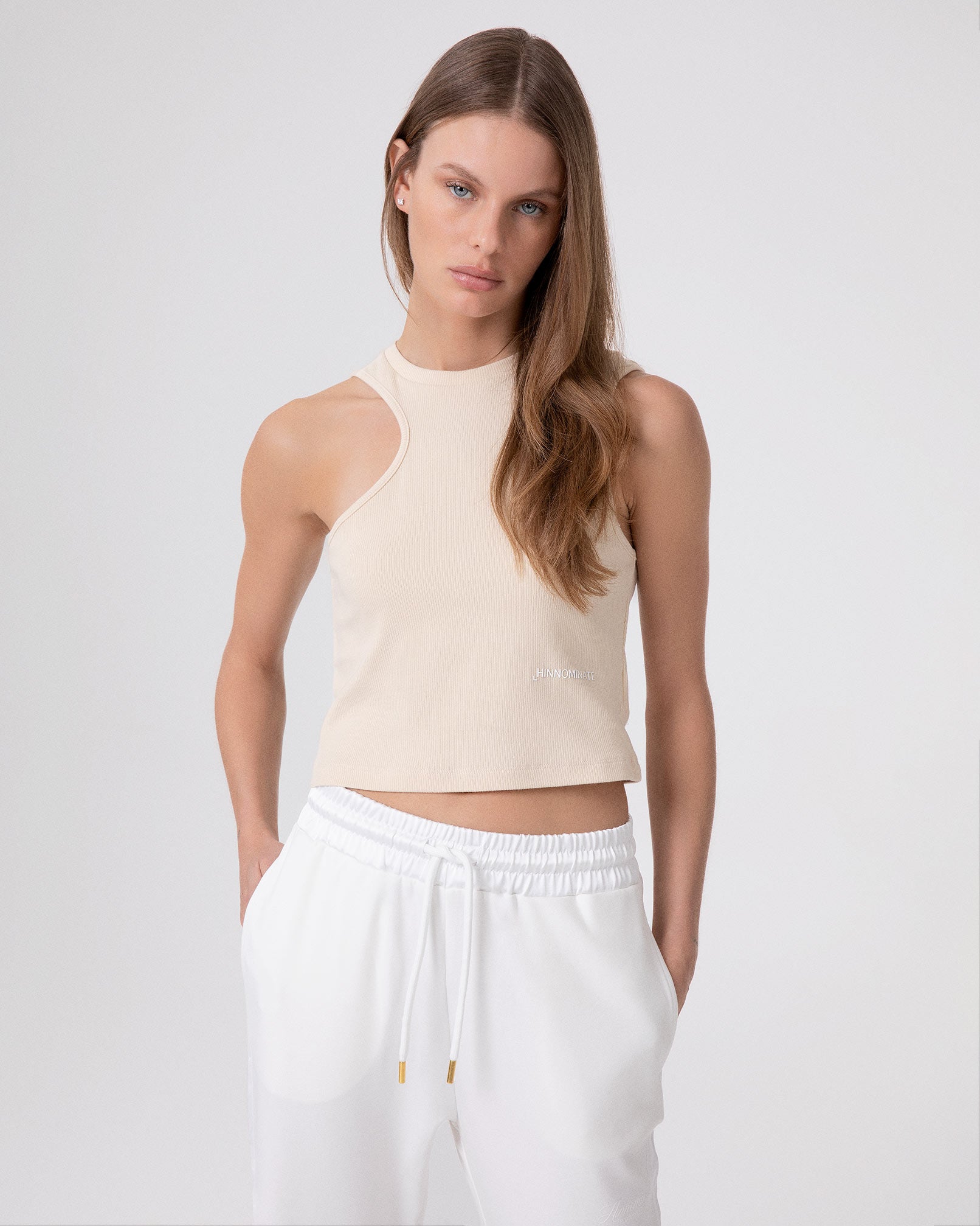 TOP IN COSTINA CON APERTURA
