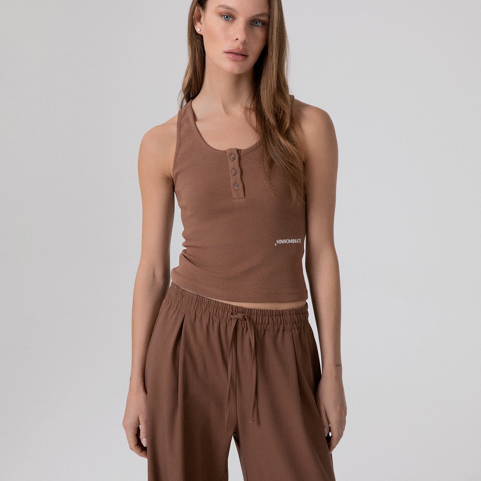 CROP TOP A CANOTTA IN COSTINA CON BOTTONI SUL DAVANTI