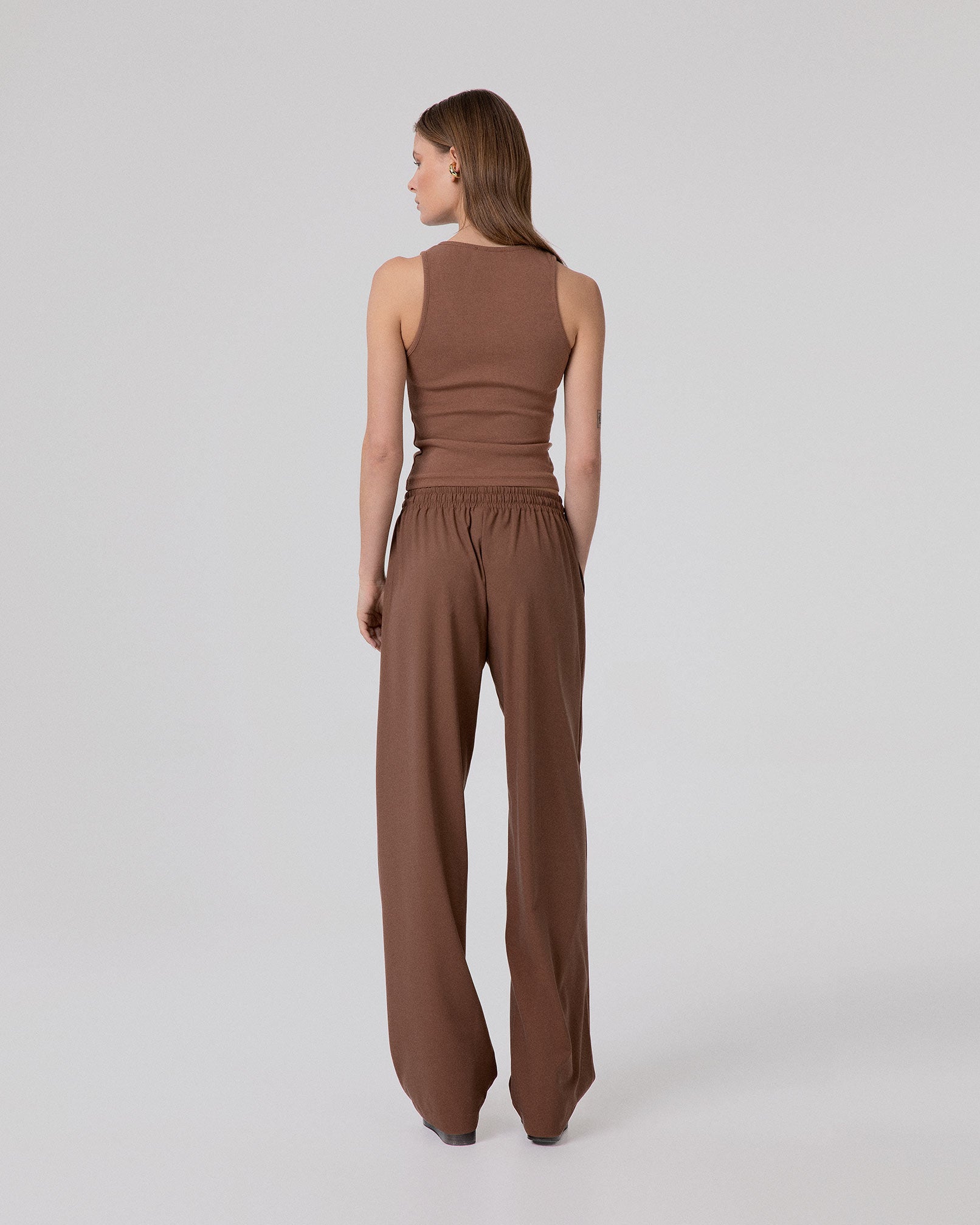 CROP TOP A CANOTTA IN COSTINA CON BOTTONI SUL DAVANTI