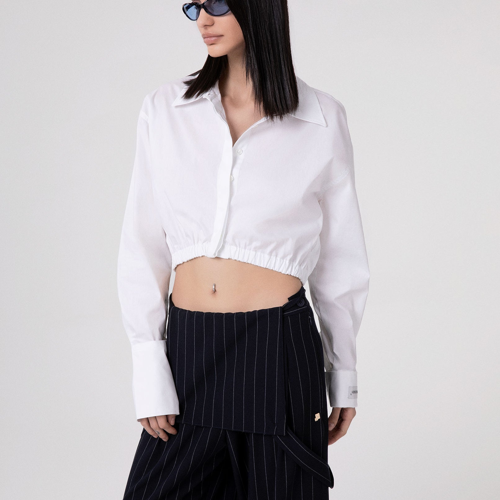 CAMICIA CORTA CON ELASTICO AL FONDO E POLSO ALTO RIGIRATO