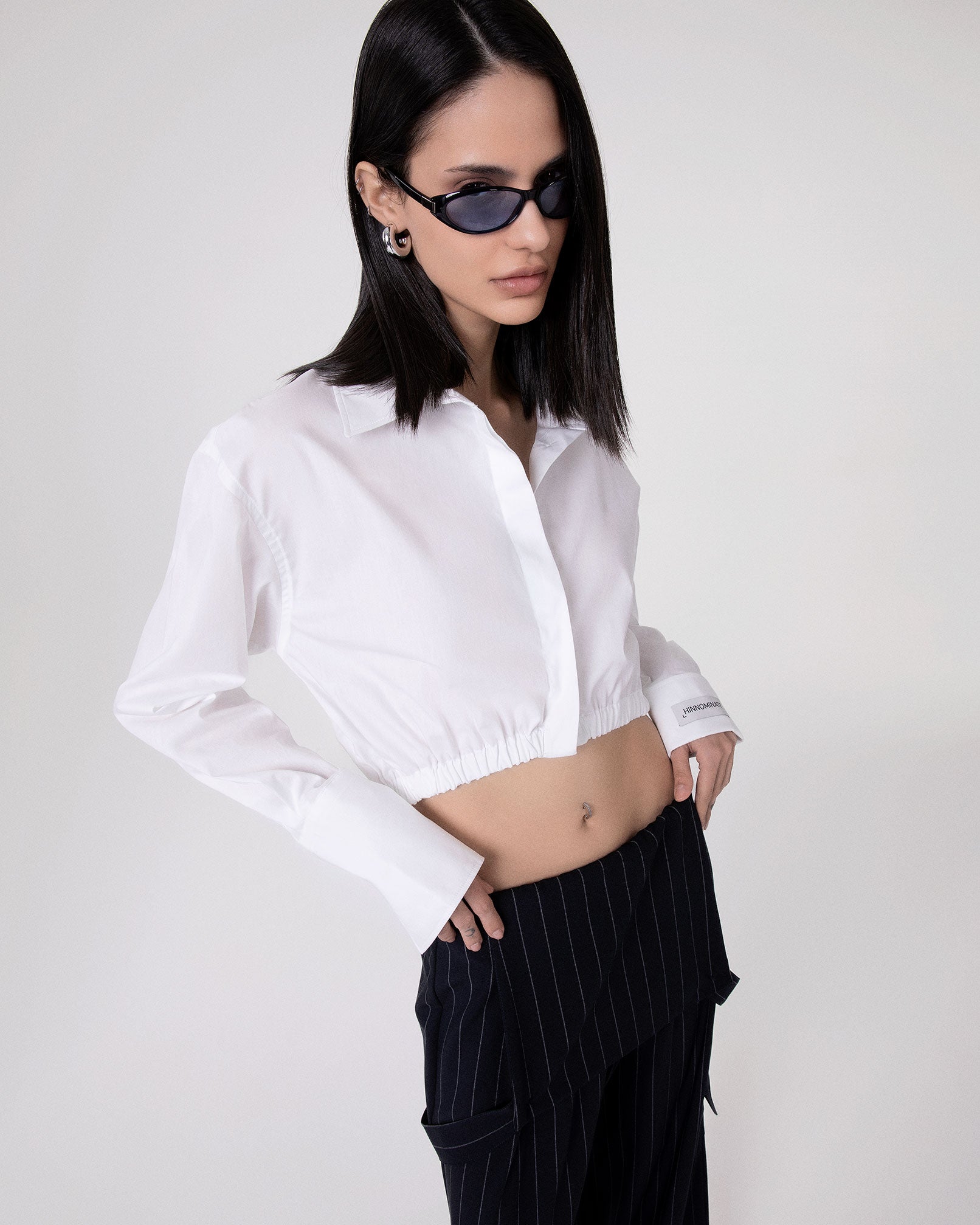 CAMICIA CORTA CON ELASTICO AL FONDO E POLSO ALTO RIGIRATO
