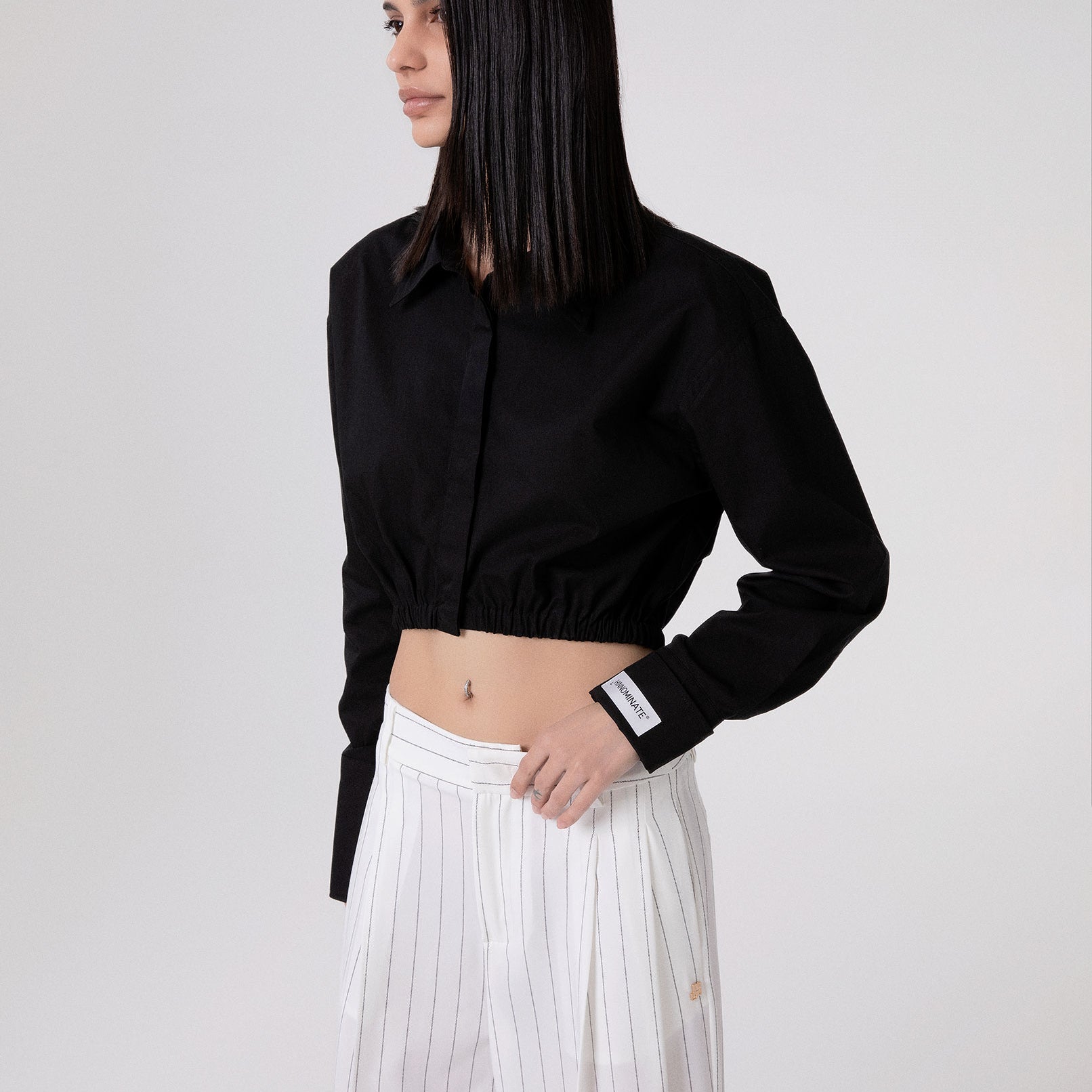 CAMICIA CORTA CON ELASTICO AL FONDO E POLSO ALTO RIGIRATO