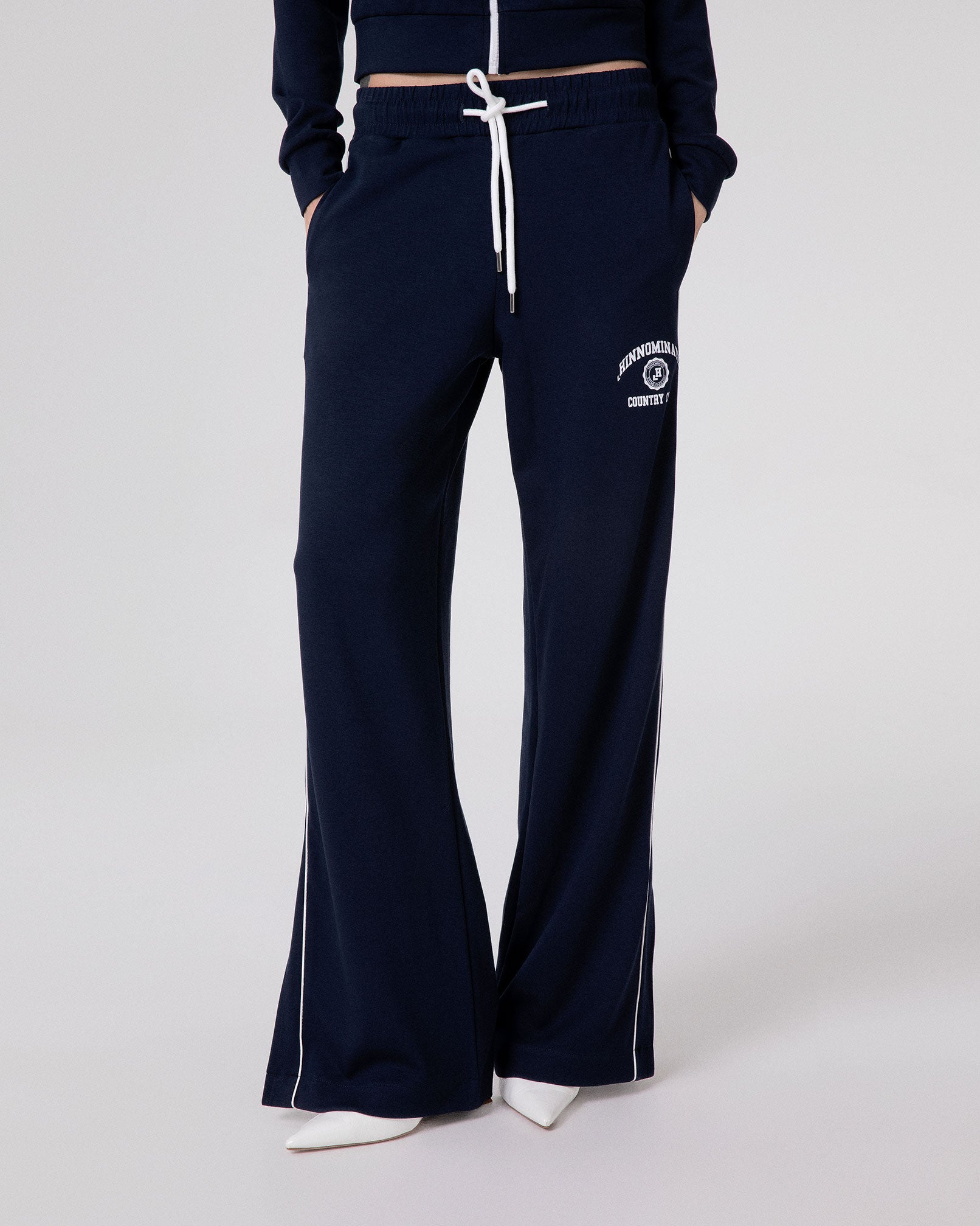 PANTALONE DRITTO IN VISCOSA CON PIPING E SPACCHI AL FONDO