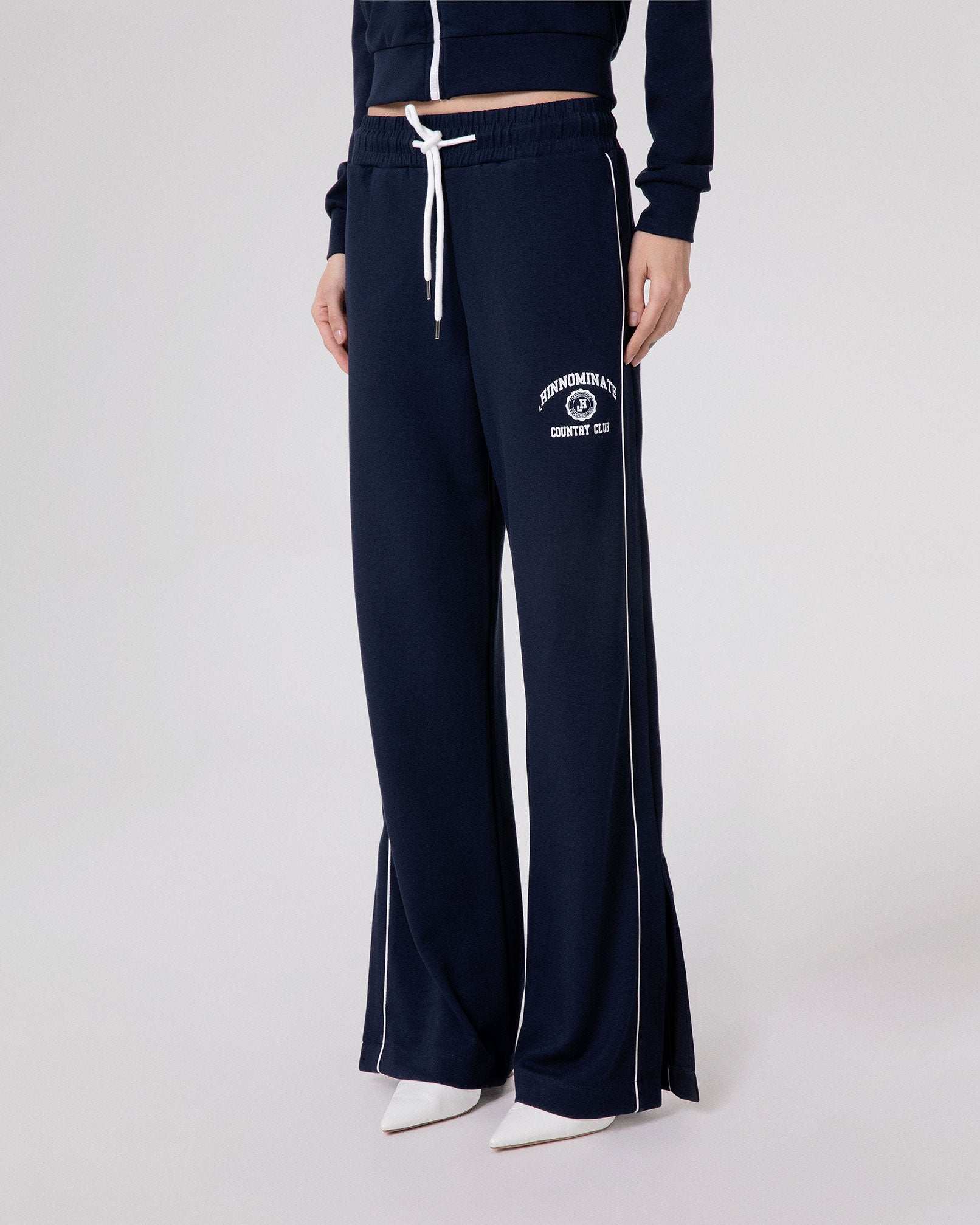 PANTALONE DRITTO IN VISCOSA CON PIPING E SPACCHI AL FONDO