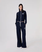 PANTALONE DRITTO IN VISCOSA CON PIPING E SPACCHI AL FONDO