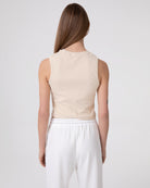 TOP  IN COSTINA CON APERTURA