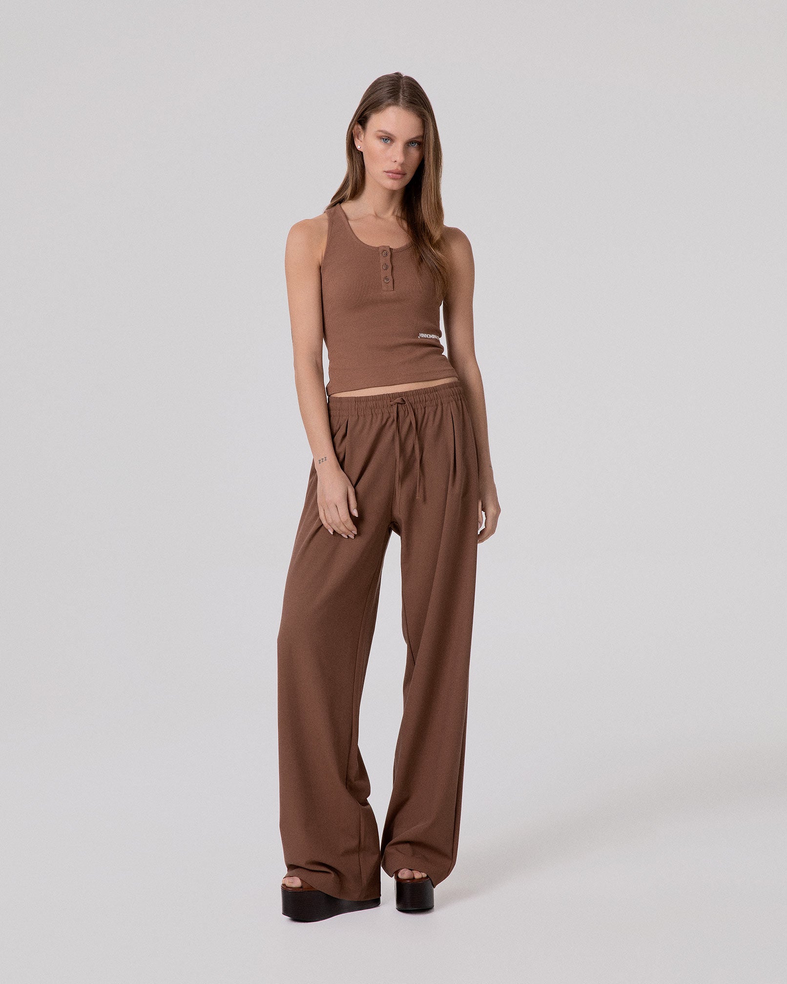 CROP TOP A CANOTTA IN COSTINA CON BOTTONI SUL DAVANTI