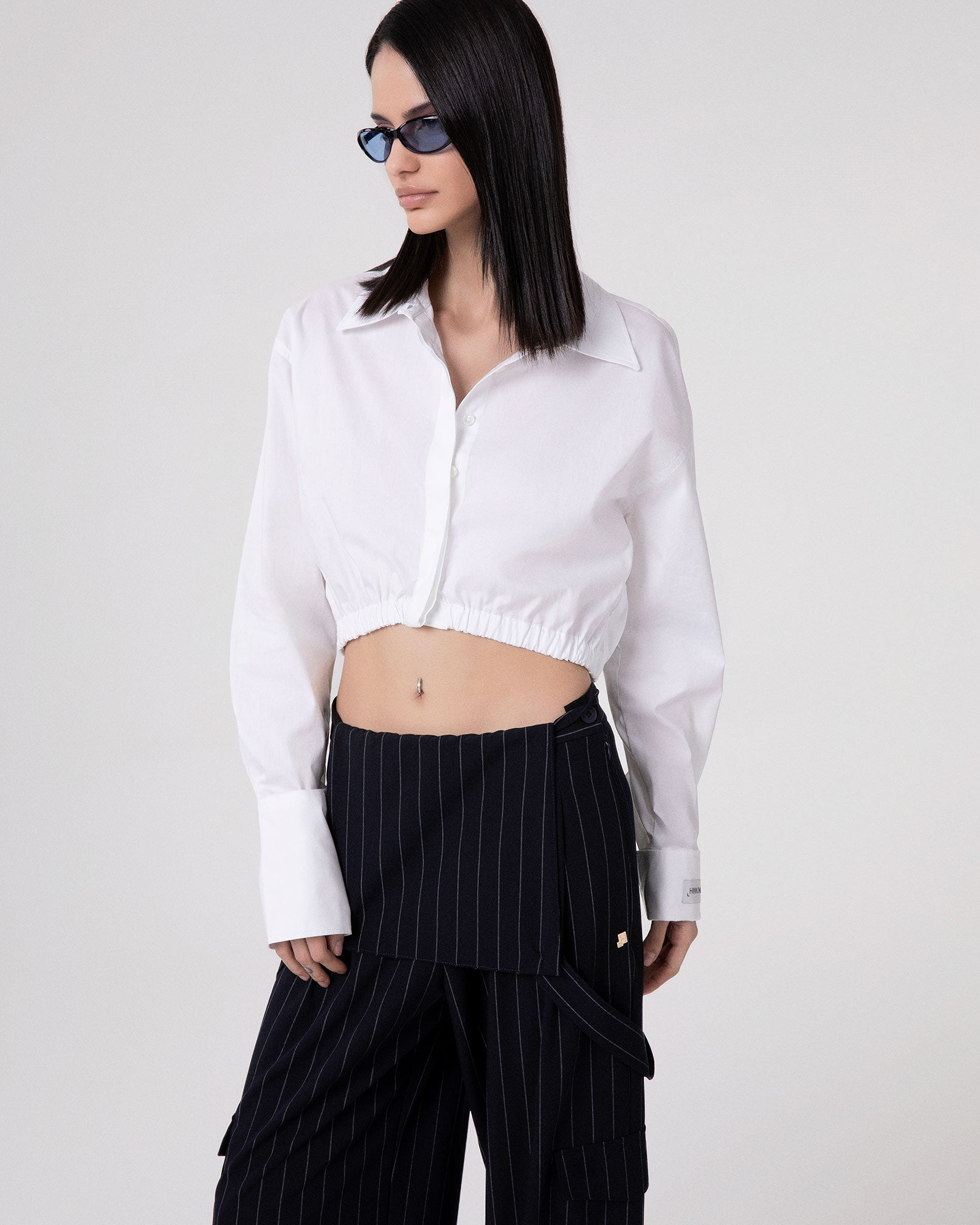 CAMICIA CORTA CON ELASTICO AL FONDO E POLSO ALTO RIGIRATO
