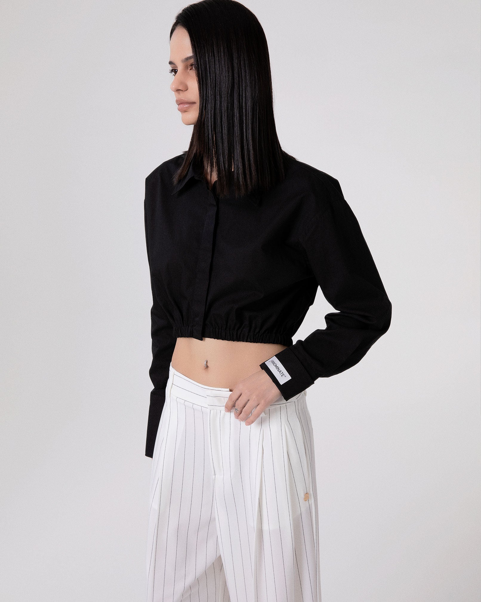 CAMICIA CORTA CON ELASTICO AL FONDO E POLSO ALTO RIGIRATO