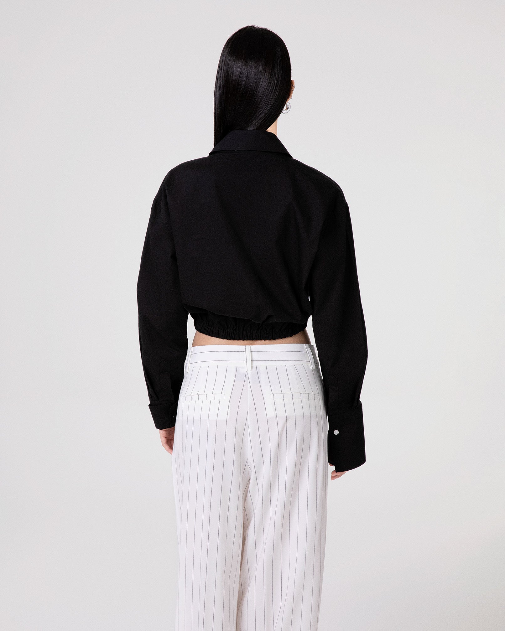 CAMICIA CORTA CON ELASTICO AL FONDO E POLSO ALTO RIGIRATO