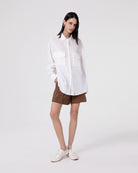 SHORTS CON RISVOLTO E PENCES IN LINO GESSATO