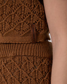 CROP TOP IN MAGLIA TRAFORATA CON M/M/ A TROMBETTA