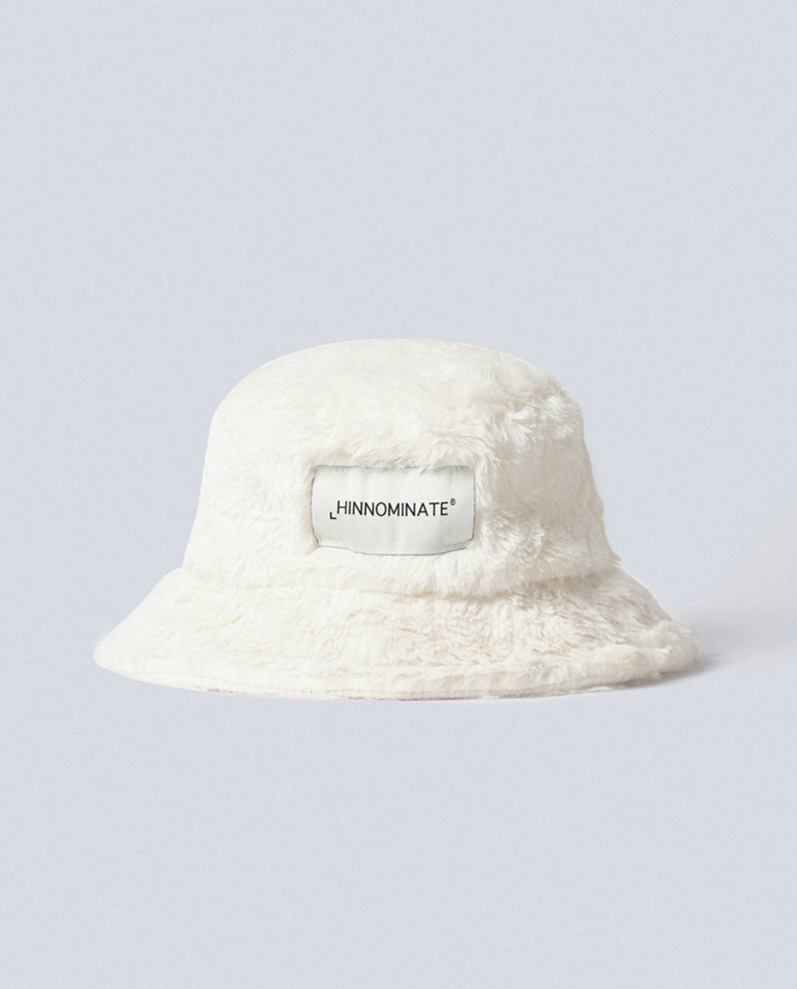 Picture of Faux fur bucket hat with label Off White