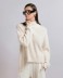 Picture of Pearly turtleneck sweater with tears Off White